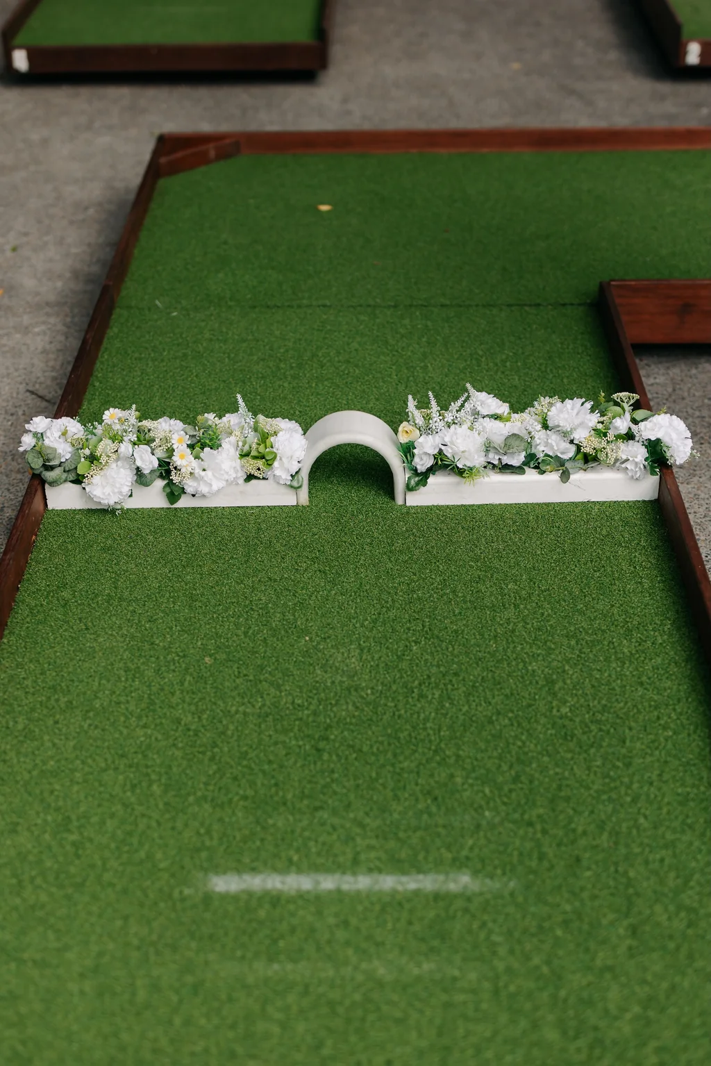 Guests celebrating mini-golf win