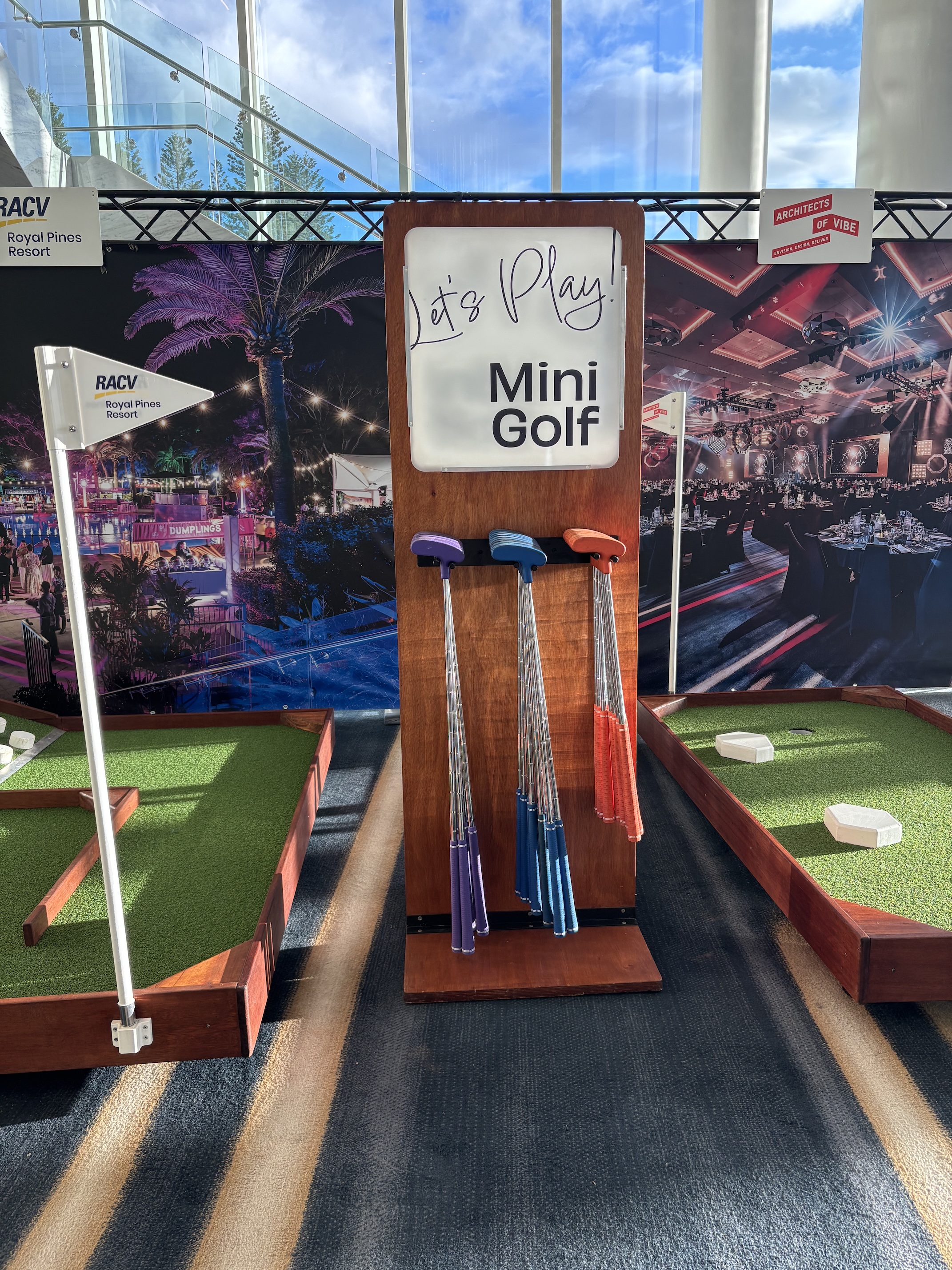 White-label mini-golf activation with custom branding at trade show